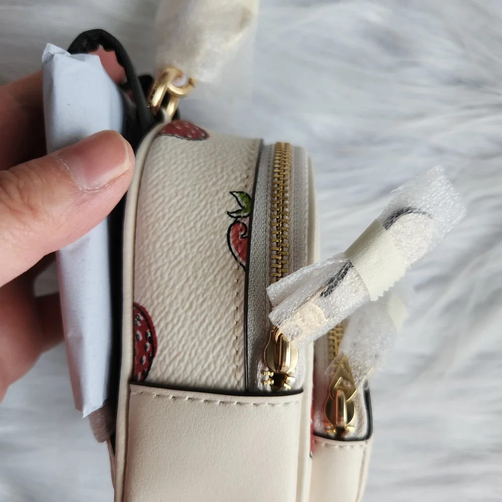 Coach Cream Mini Backpack Keychain with Strawberry Print - Picture 2 of 8